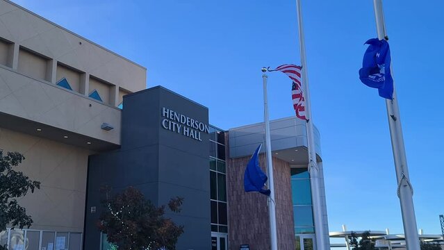 Henderson NV USA, American, State and City Flag Waving in Front of City Hall Building