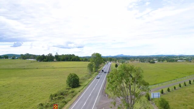 Traffic on the Cunningham Highway at Aratula in regional Australia.
