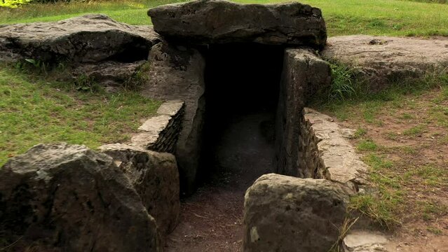 Waylands Smithy early Neolithic chambered long barrow tomb Oxfordshire, UK dates from approx 3600 BC. Video from chambers entrance to fa&ccedil;ade sarsens