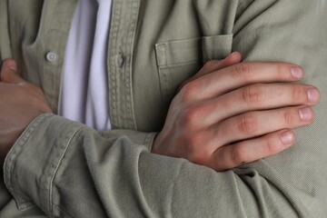 Man with space for tattoo on his hands, closeup