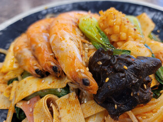 spicy seafood soup on a plate