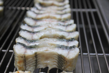 sliced eel on the grill