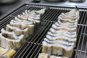 sliced eel on the grill