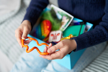 Close Up Of Teenage Girl At Home Using Soothe Box To Help With Stress And Anxiety