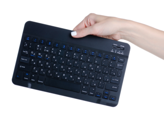 Black mini PC keyboard in hand on white background isolation