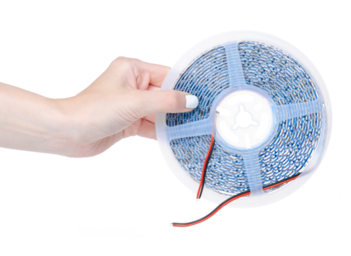 Led lights tape in hand on white background isolation