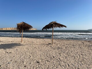 beach with umbrellas