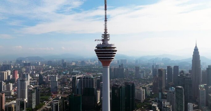KL Tower On Sunny Day In Kuala Lumpur, Malaysia. aerial shot, zoom-in