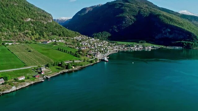 Village Of Aurlandsvangen On Shore Of Aurlandsfjord In Vestland County, Norway. wide drone shot