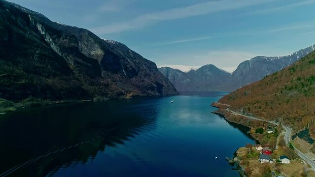 Scenic View of Sognefjord Amidst Towering Cliffs And Valley In Vestland County, Western Norway. aerial shot