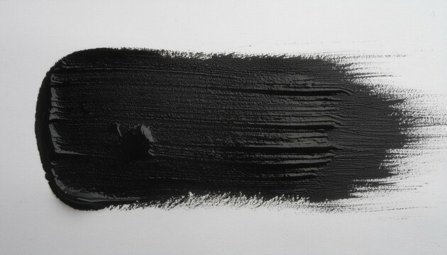 photo of wet dark lino ink remain, black linocutting paint roller texture isolated on white paper background.