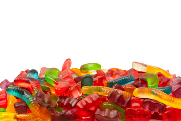 Assorted colorful gummy candies isolated on a white background.