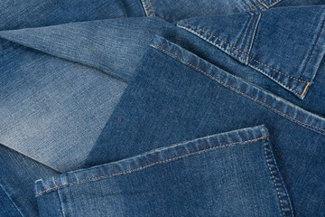 Blue jeans denim texture as a background. Top view.