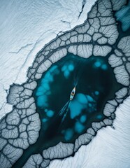 boat is seen from above, floating in the center of a frozen lake. The lake is full of cracks and the ice is melting, revealing blue water. - 800353902