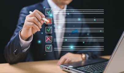 Business performance evaluate checklist review, businessman using pen computer online checklist...