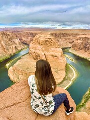Woman watching Horseshoe Bend