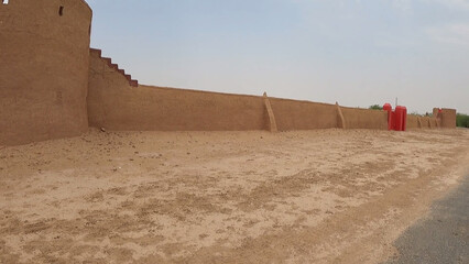sand castle in the desert Village Desert House Sand Hut Desert Trees Bushes Dirt Path 