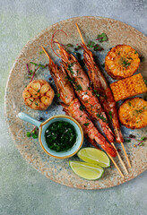 langoustines on skewers, shrimp kebab, with fried corn, spices and herbs, homemade, no people,