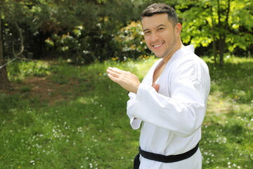Sporty man with a kimono posing 