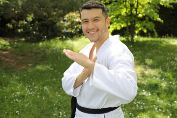 Sporty man with a kimono posing