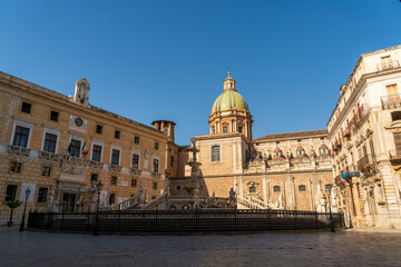 Palermo, Sicily, Italy. Pretoria Fountain - A 16th-century fountain known for its grand composition of a series of pools and statues of mythological characters. Sunny summer day