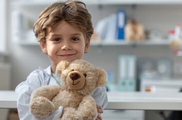 A young boy holds his teddy bear closely while waiting at a doctor's office or hospital clinic for medical care