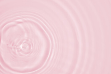 Abstract transparent water shadow surface texture natural ripple on pink background