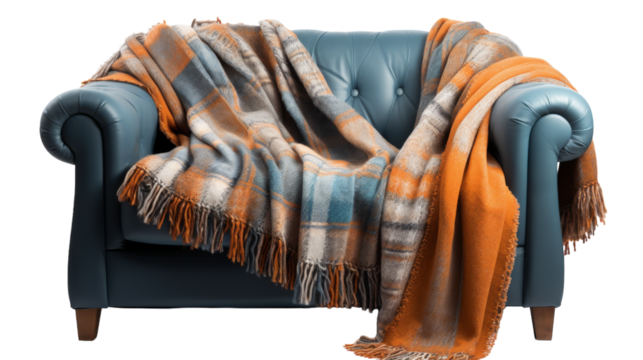 A serene scene of a cozy blue chair adorned with a plaid blanket on transparent background