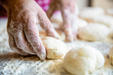 Baking at home. Homemade cakes dough in the women's hands. Process of making pies, hand. Hands pie...