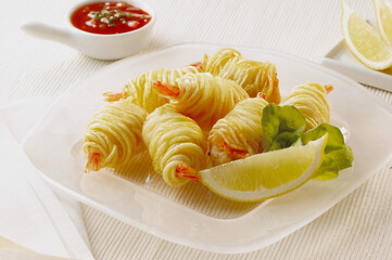 Group of potato batter stuffed by prawns