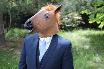 Businessman with a horse face 