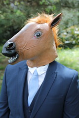 Businessman with a horse face 