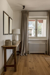 Corner of a living room with beautiful rural decoration furniture and wooden plank floors