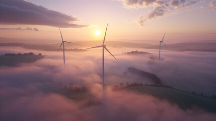 Aerial view of three wind turbines in the early - obrazy, fototapety, plakaty