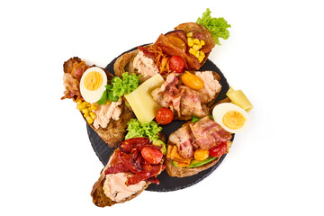 Assorted bruschetta with various toppings, isolated on white background. High resolution image