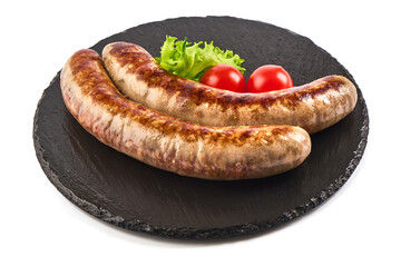 Grilled German pork sausages, Thuringer Rostbratwurst, close-up, isolated on white background