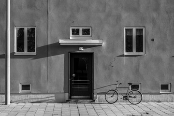 A bicycle parked at a building