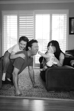 Candid Family Photo In Livingroom