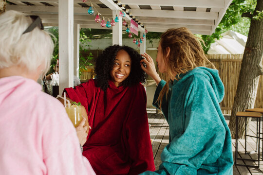 Outdoor Gathering With Friends at the summer cafe