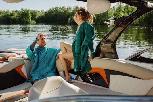 Couple Relaxing on a Luxury Boat in Summer