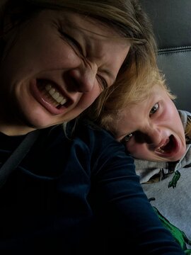 Joyful Scream: Mother and son Sharing a Laugh