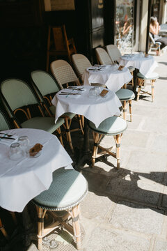 Restaurant tables with white tablecloth 