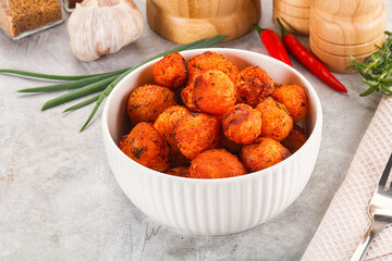 Baked young potato with paprika