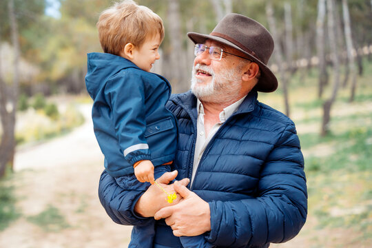 Cute image of a grandfather with his grandson