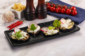Grilled eggplant with cheese and radish
