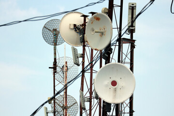 Satellite dishes are designed to receive signals from an artificial satellite.