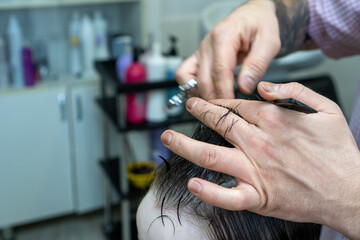 hairdresser cutting hair