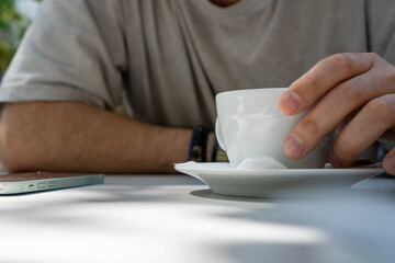 person holding a cup of coffee