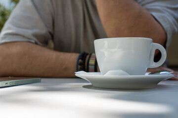 person holding a cup of coffee