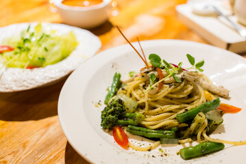 Pasta with different vegetable at restaurant